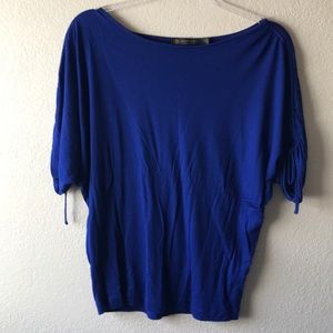 Bright blue/purple top